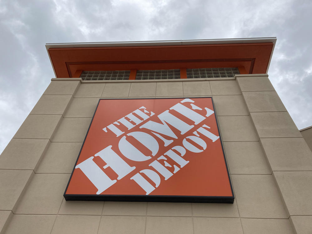 A Home Depot logo sign hangs on its facade on May 14, 2021, in North Miami, Fla. Home Depot reported its financial earnings on Tuesday.