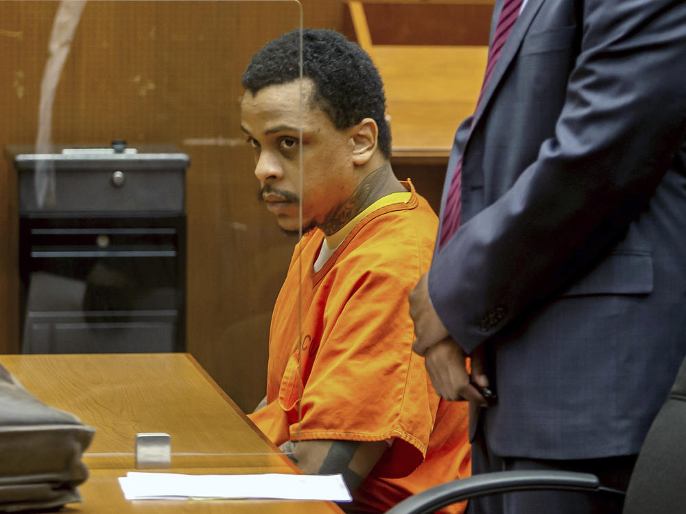 Eric R. Holder Jr. sits in the courtroom at Clara Shortridge Foltz Criminal Justice Center on Sept. 15, 2022, in Los Angeles. Holder, who was convicted last year of fatally shooting rapper Nipsey Hussle in 2019, was sentenced Wednesday to 60 years to life in prison.