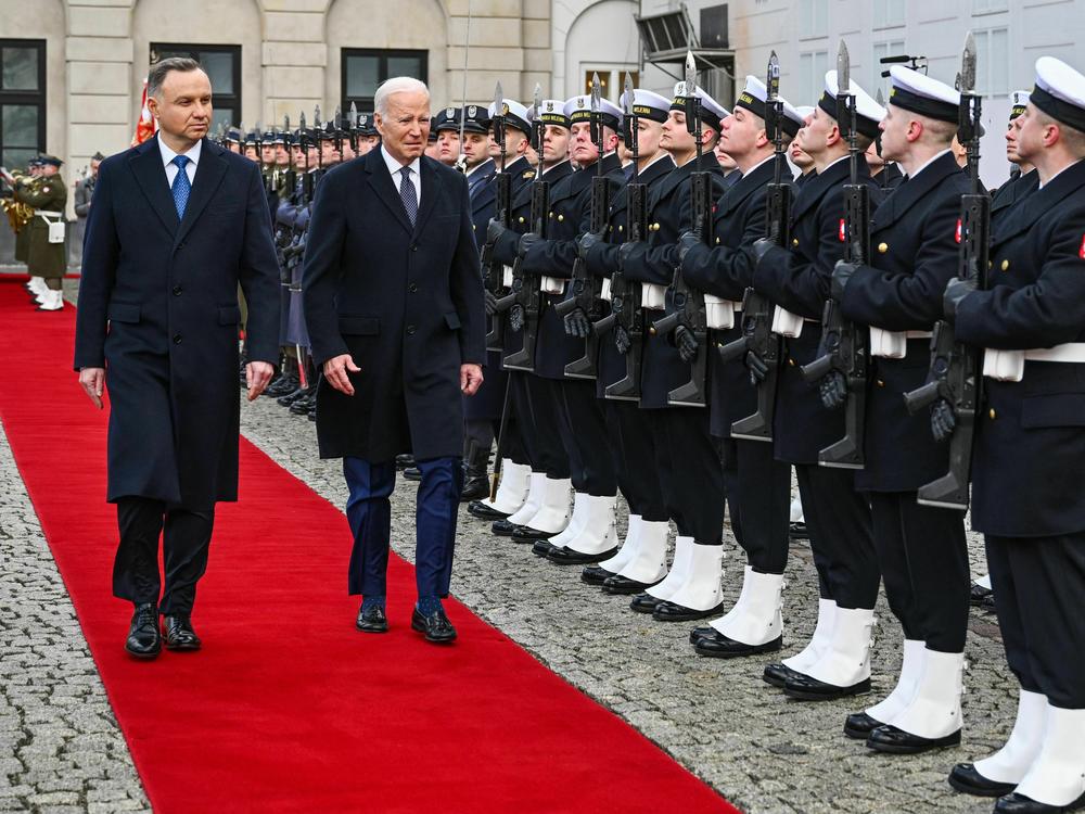 U.S. President Joe Biden and Polish President Andrzej Duda review a military honor guard during a welcoming ceremony prior talks at the Presidential Palace in Warsaw on Feb. 21.