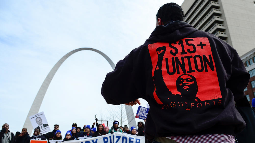 Protesters rally outside of a Hardee's restaurant on Feb. 13, 2017, in St Louis, Mo., in support of raising the minimum wage.
