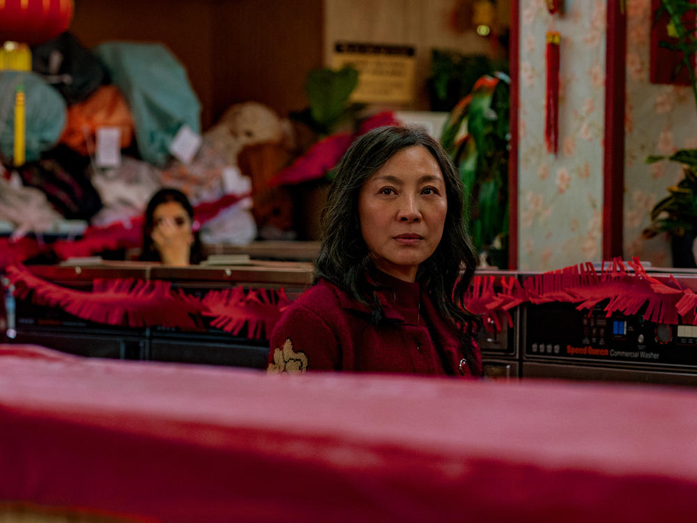 Michelle Yeoh is laundromat owner Evelyn Wang in <em>Everything Everywhere All at Once.</em>