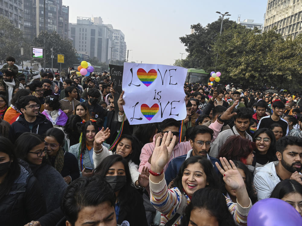LGBTQ people and their supporters march demanding equal marriage rights in New Delhi, India, in January. India's Supreme Court in 2018 struck down a colonial-era law that made gay sex punishable by up to 10 years in prison but has yet to legalize same-sex marriages.