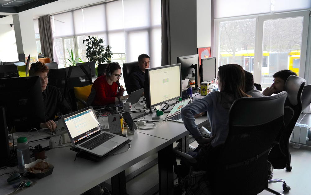 People, mostly in the tech sector, working at the 1991 coworking space in Mariupol, Ukraine, on Feb. 11, 2022.