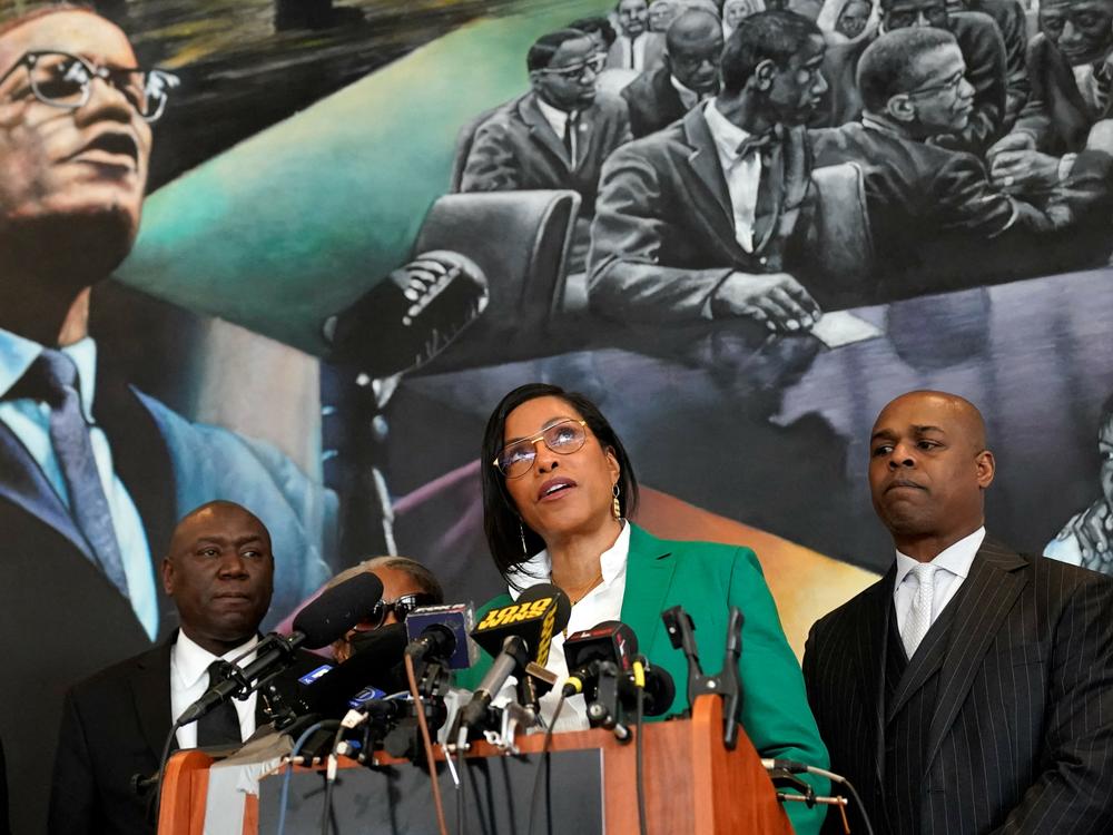 Ilyasah Shabazz (C), daughter of African-American activist Malcolm X, speaks alongside civil rights attorney Ben Crump (L) and co-counsel Ray Hamlin (R) during a press conference in New York on February 21, at the Malcolm X & Dr. Betty Shabazz Memorial and Educational Center, formerly known as the Audubon Ballroom, where Malcolm X was shot dead at 39 on Feb. 21, 1965.