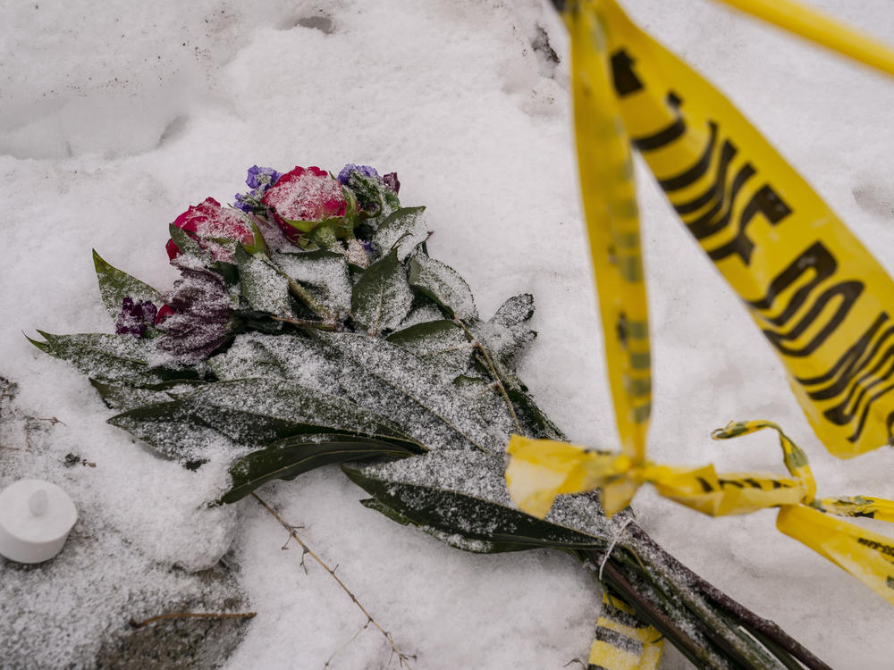Flowers are seen outside the off-campus home where the quadruple murder took place in Moscow, Idaho.