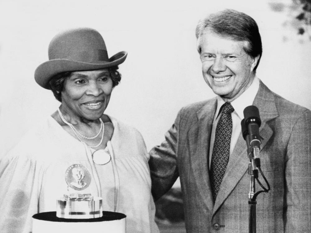 October 17, 1978: Famed singer Marian Anderson, left, and President Jimmy Carter, right, are shown at a White House ceremony at which Anderson was presented with a special congressional award for services to the nation. Carter praised Anderson as one who had brought great joy to the nation's millions of people.