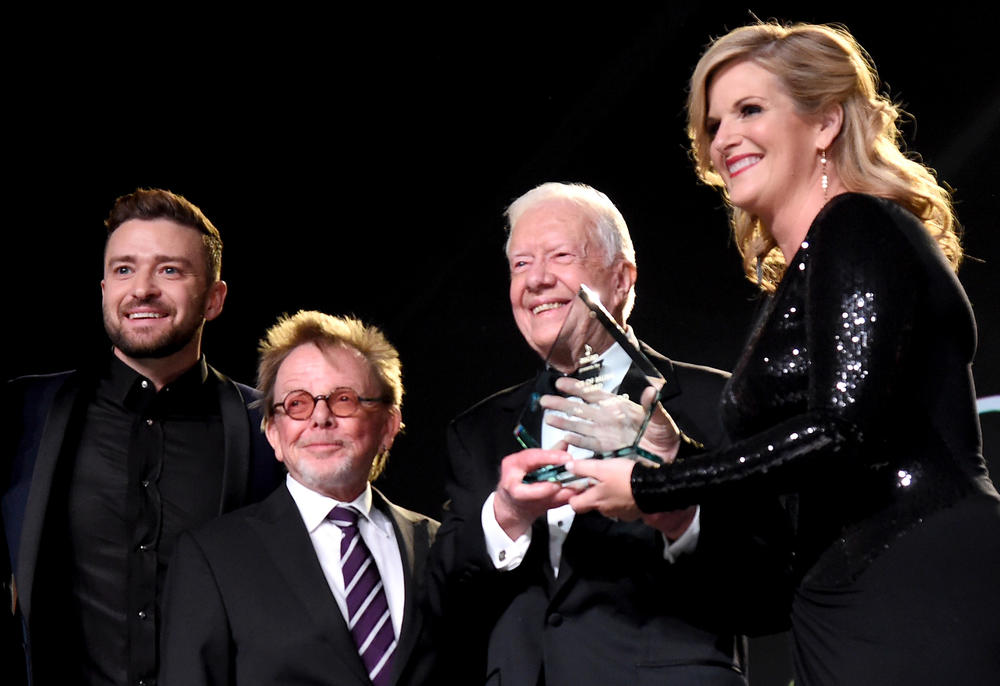 Nov. 2, 2015: Justin Timberlake, Paul Williams, the President and Chairman of the Board for the ASCAP, and President Jimmy Carter present Trisha Yearwood (R) with the Voice of Music Award onstage during the 53rd annual ASCAP Country Music awards at the Omni Hotel in Nashville, Tenn.
