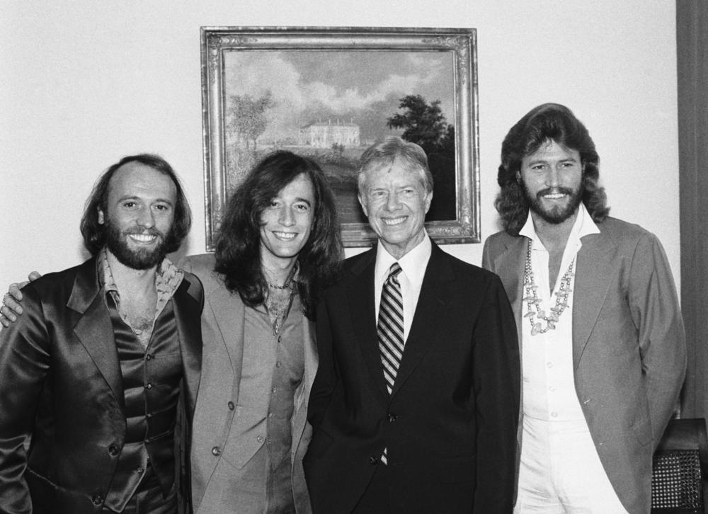 Sept. 24, 1979: The famed rock group the Bee Gees — (L-R) Maurice, Robin and Barry — visit President Carter at the White House.