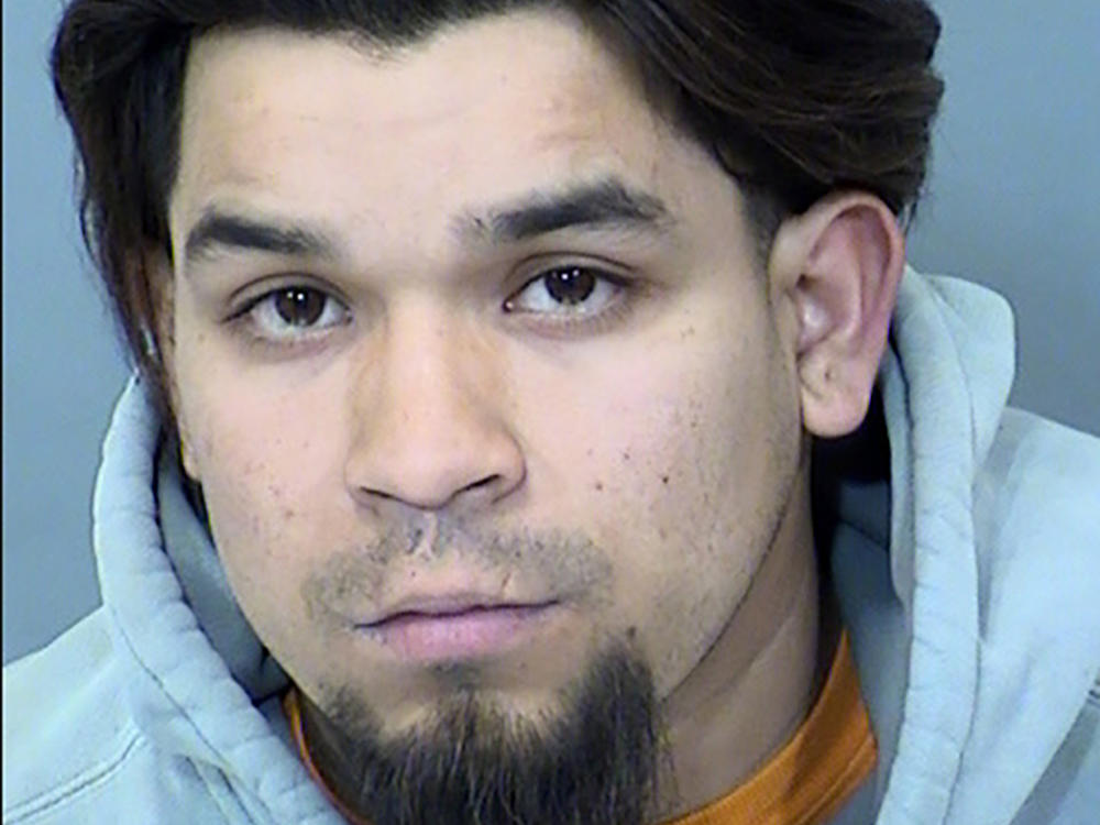 This Sunday booking photo provided by the Goodyear Police Department shows suspect Pedro Quintana-Lujan, 26. He was arrested in connection with a crash that killed two bicyclists and injured 11 others in Goodyear, a Phoenix suburb, authorities said Sunday.