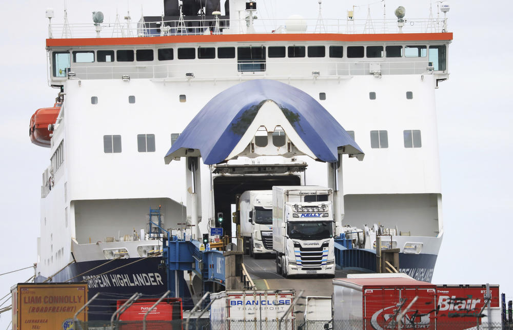 Freight trucks arrive from Scotland at Larne Port, Northern Ireland, Monday. A newly reached deal will change some of the rules around how goods enter the area.