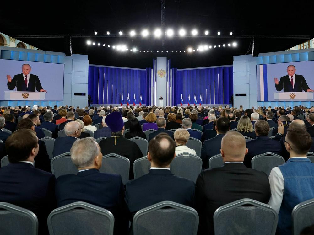 Russian President Vladimir Putin delivers his annual state of the nation address in central Moscow on Feb. 21. Putin hasn't pulled back on using 
