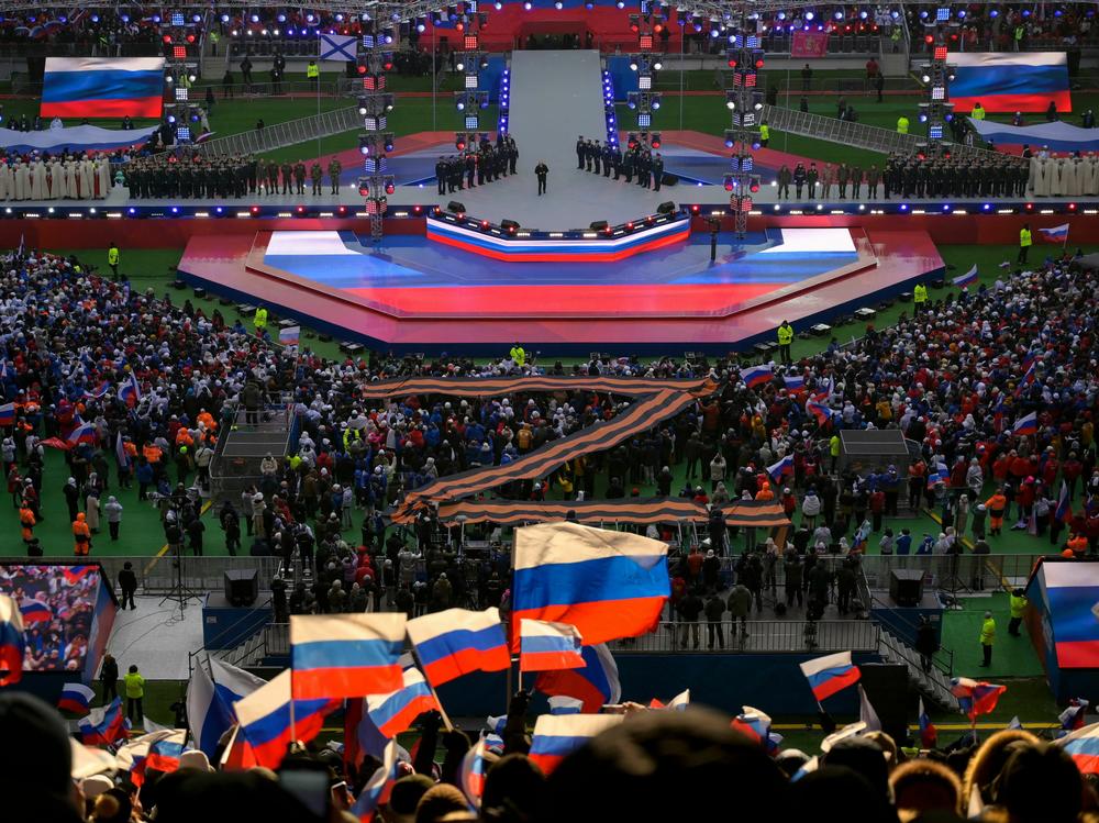 Russian President Vladimir Putin speaks during a patriotic concert in Moscow just ahead of the one-year anniversary of Russia's invasion of Ukraine on Feb. 22, 2023.