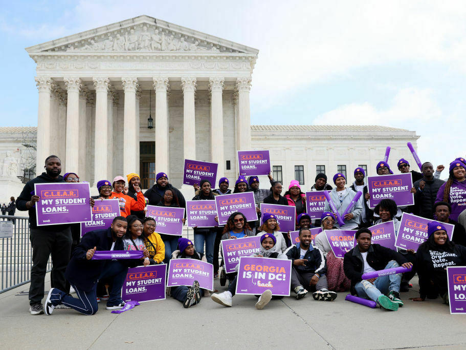 Student loan borrowers and advocates gather Tuesday for a rally during the Supreme Court's arguments on President Biden's student debt relief plan.