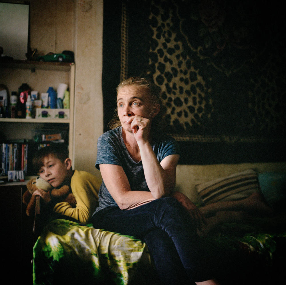 Svitlana and her son Danil in a dormitory room in Sloviansk, Donetsk region, where they lived before evacuating from Donbas. June 2022.