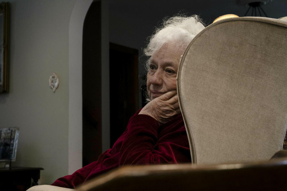 Adele Welty, whose son died in the 9/11 attacks, sits in her home in Queens, in New York City.