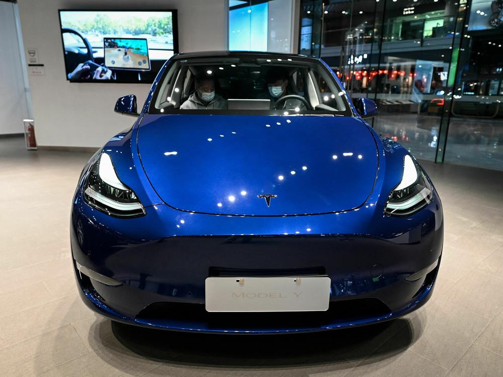 A Tesla Model Y car is shown at a Tesla showroom in a shopping mall in Beijing, China, on April 29, 2022. Tesla shares fell after it did not reveal a new car at its investor day.