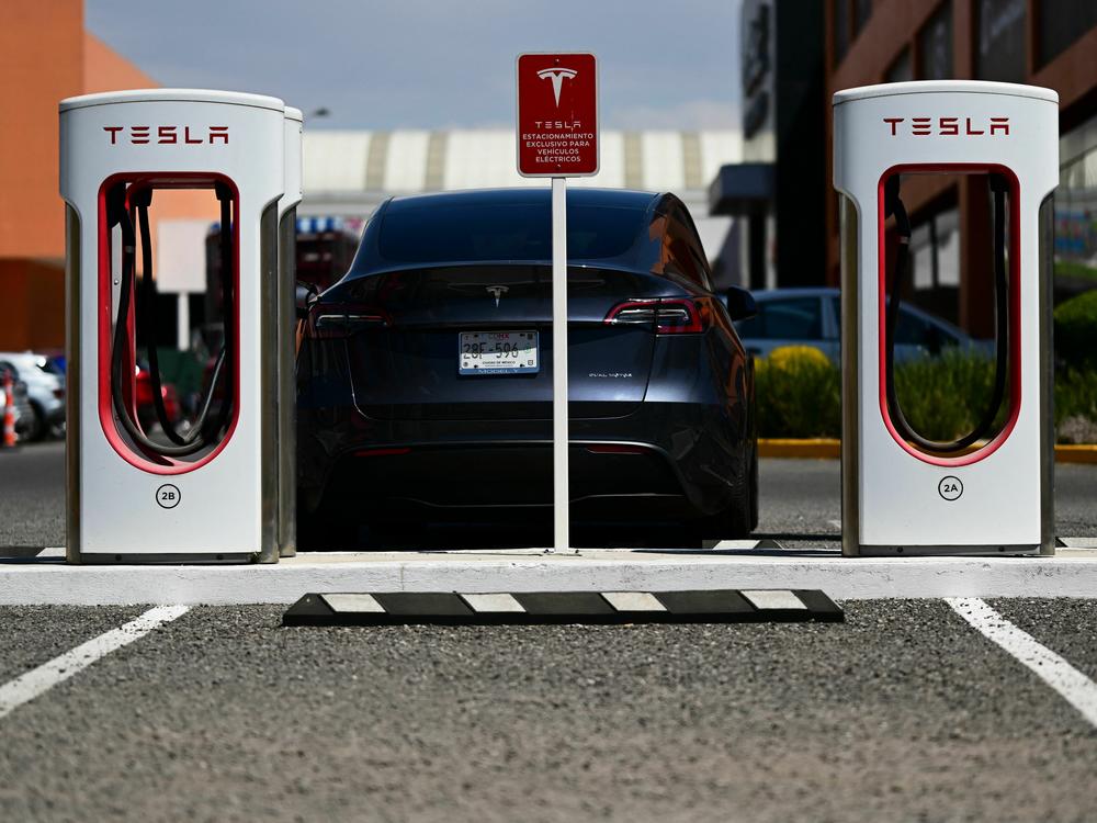 A Tesla charging station for electric cars is seen at the parking lot of a mall in Puebla, Mexico, on Feb. 26, 2023. Tesla executives talked about new ideas about every facet of its business, including on charging, at its investor day.