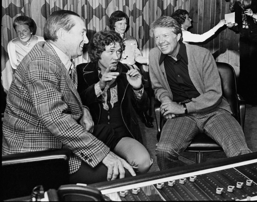 1974: Georgia Gov. Jimmy Carter visits Capricorn Records during the production of Dickey Betts' debut album, <em>Highway Call</em>.