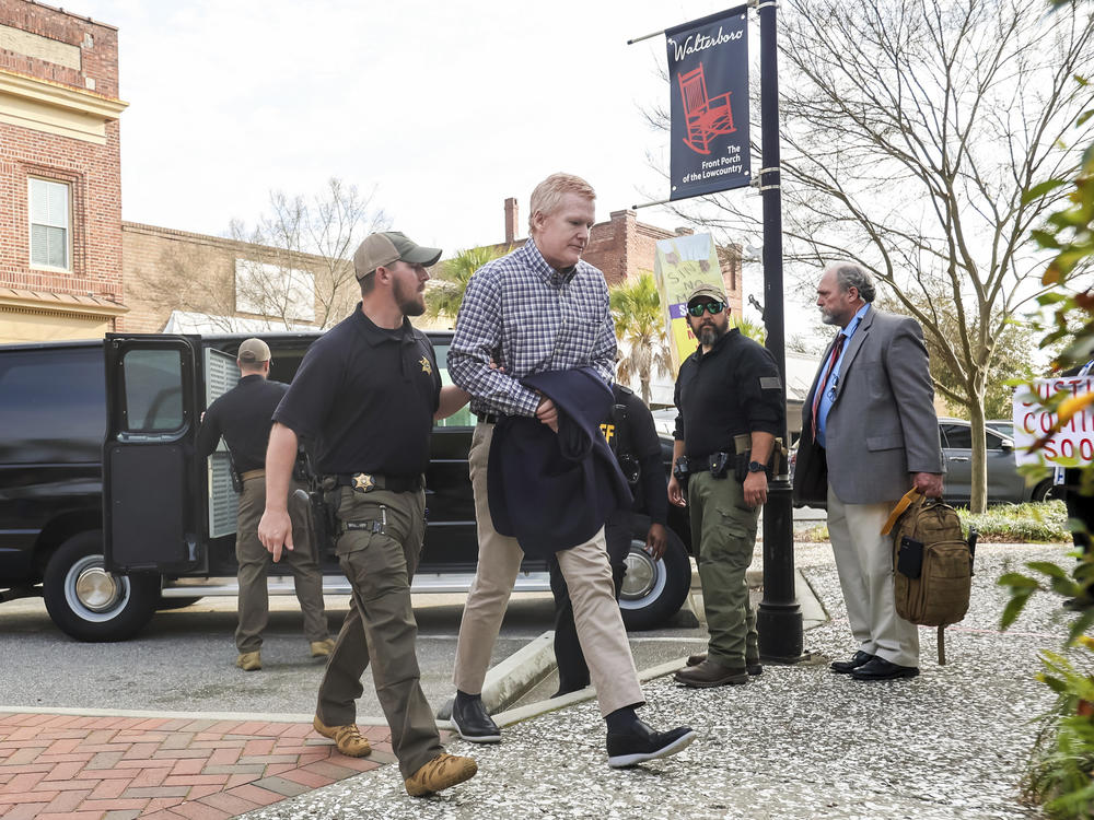 Alex Murdaugh faces life in prison for the double murders of his wife and son. He's seen here being escorted into the the Colleton County Courthouse in Walterboro, S.C., on Monday.