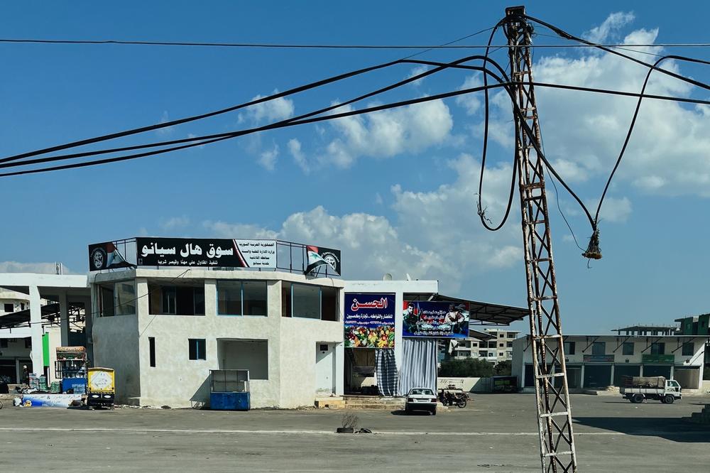 Mangled electrical wires in the city of Jableh. Syrians across the country are without power throughout much of the day due to a shortage of imported fuel. Many must boil hot water on woodfire for cooking, washing clothes and bathing. The government blames U.S. sanctions for the fuel shortages. The government has also lost control of its northeastern oil fields to U.S.-backed Kurdish-led forces.