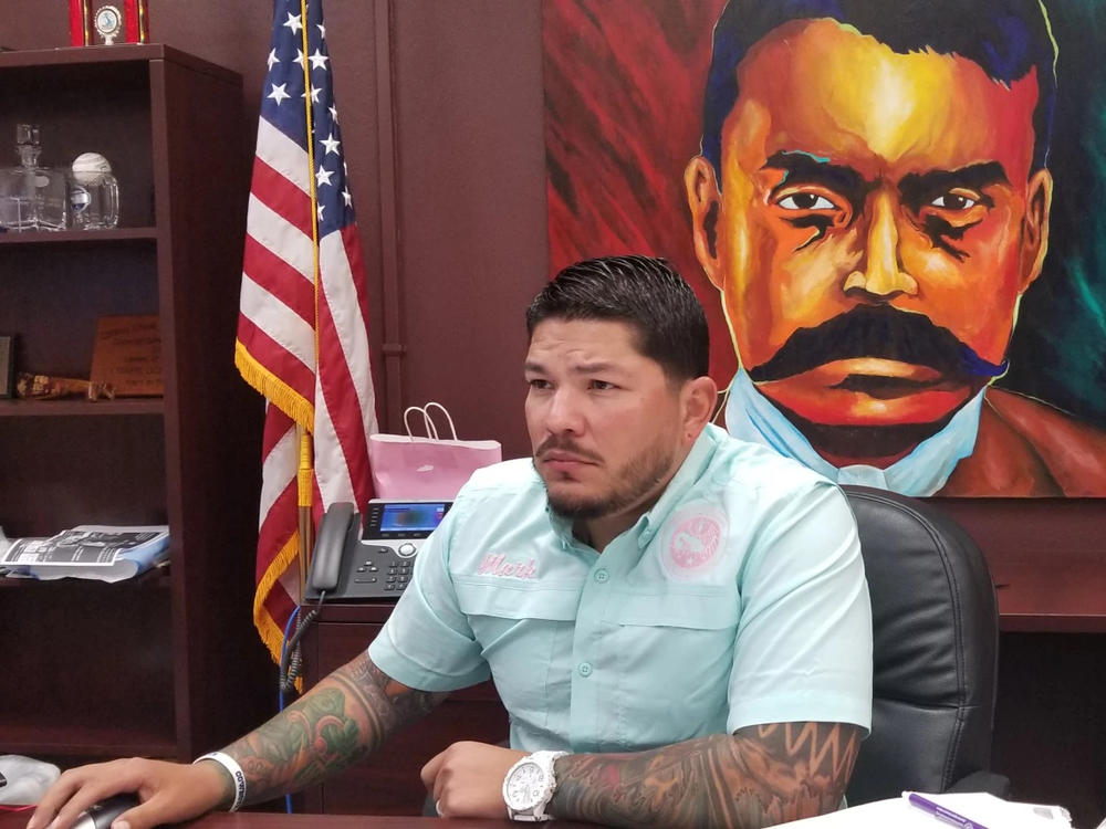 Nueces County District Attorney Mark Gonzalez studies past criminal cases his office has prosecuted, inside the county courthouse in Corpus Christi, Texas in 2019.