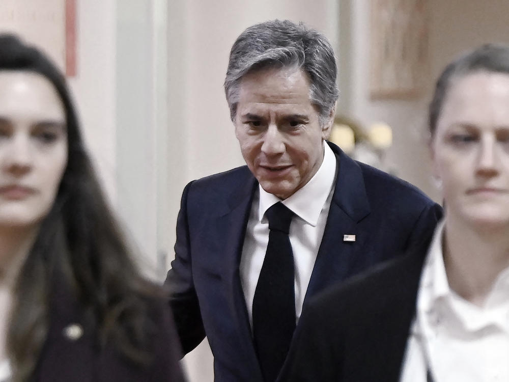 Secretary of State Antony Blinken walks to a meeting on the sidelines of the G-20 foreign ministers' meeting in New Delhi on Thursday.