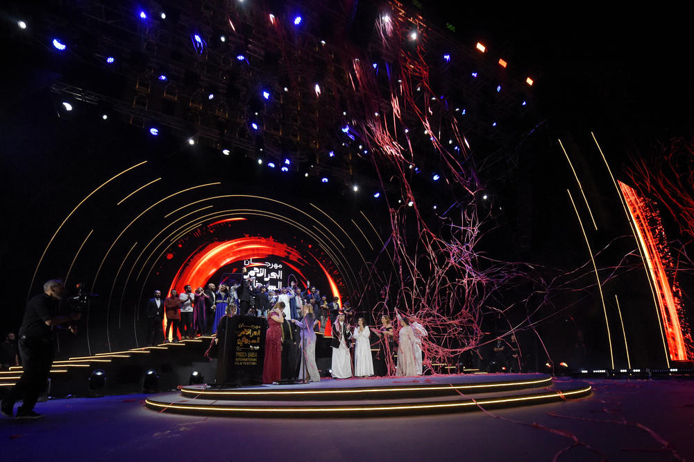 Award winner celebrate on stage during the finale of the Closing Night Gala Awards at the Red Sea International Film Festival on December 08, 2022 in Jeddah, Saudi Arabia.