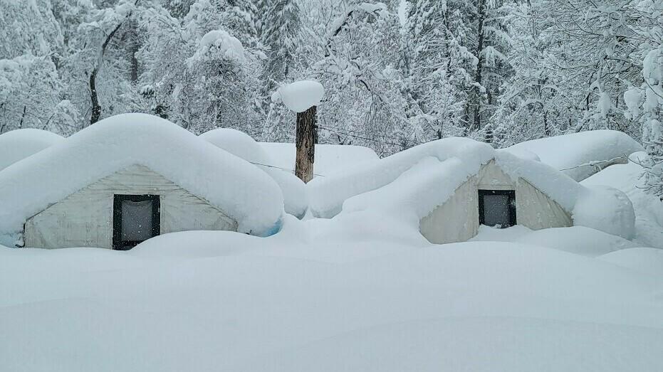 Tents at Curry Village are covered with snow in Yosemite National Park on Tuesday.