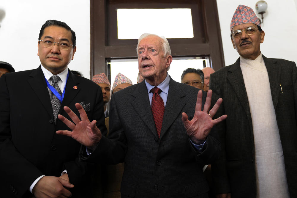 November 17, 2013: Former president of the United States, Jimmy Carter (C) speaks to the media after meeting with Nepal's Chairman of the Interim Election Government, Khilraj Regmi (R) in Kathmandu on November 17, 2013. Carter will be in Nepal for six days and will observe the Constituent Assembly election scheduled for November 19.