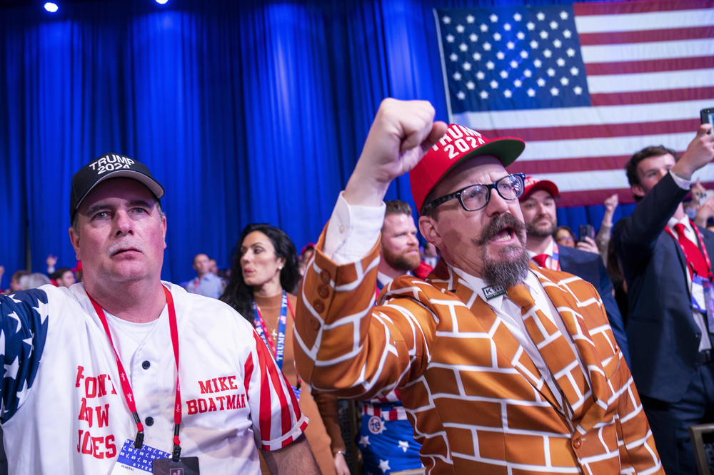 Supporters cheer as former President Donald Trump speaks at CPAC on Saturday.