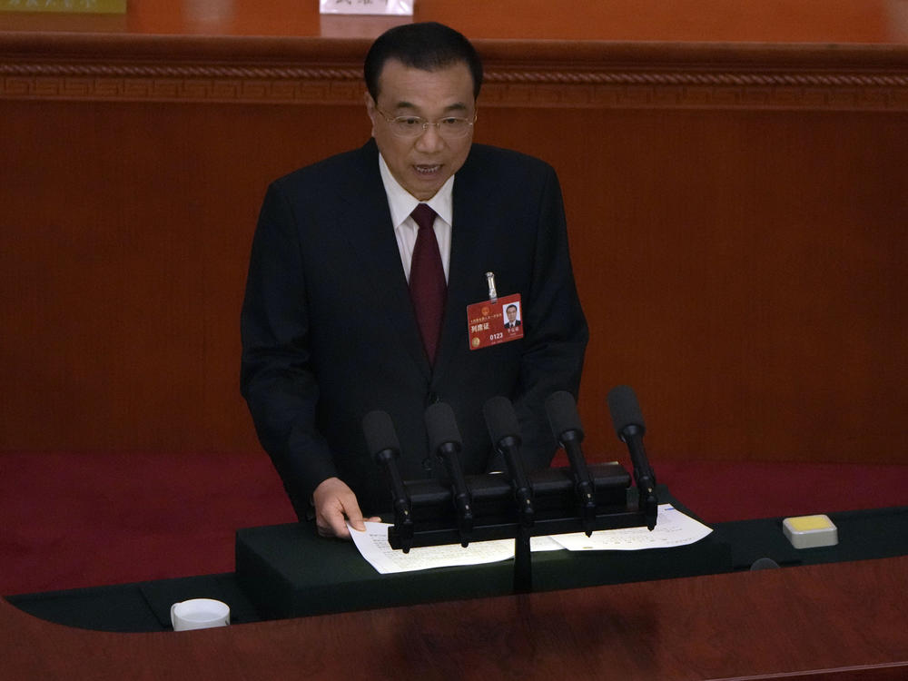 Chinese Premier Li Keqiang speaks during the opening session of China's National People's Congress (NPC) at the Great Hall of the People in Beijing, Sunday, March 5, 2023.
