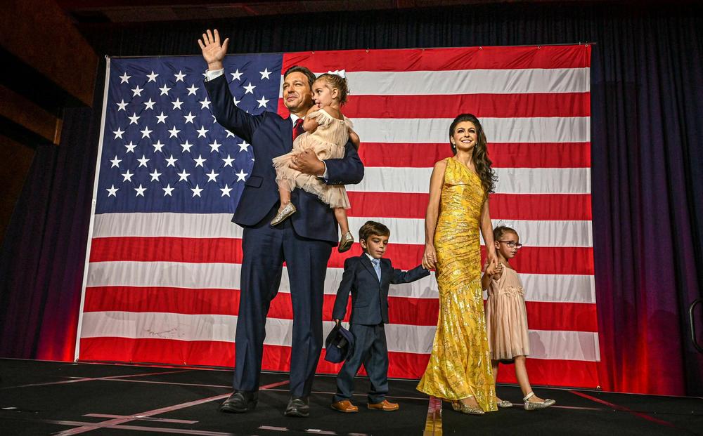 Florida Gov. Ron DeSantis, with his wife Casey and children Madison, Mason and Mamie, waves to the crowd during a midterm election night watch party on Nov. 8, 2022.