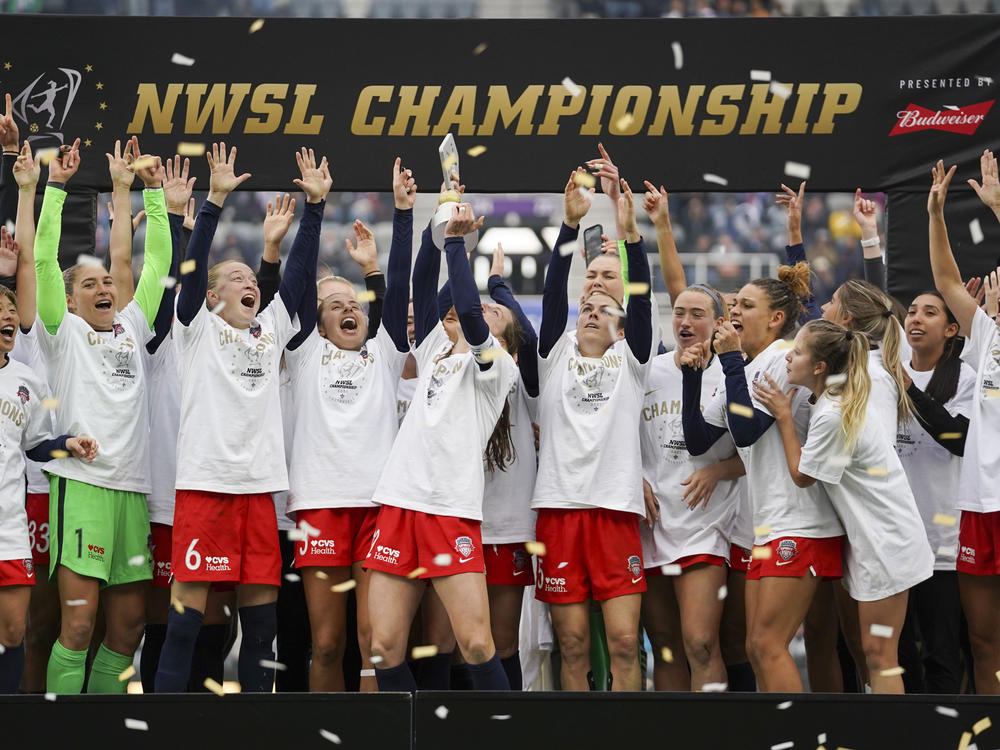 Washington Spirit players celebrate after defeating Chicago Red Stars in the NWSL Championship soccer match Nov. 20, 2021, in Louisville, Kentucky.