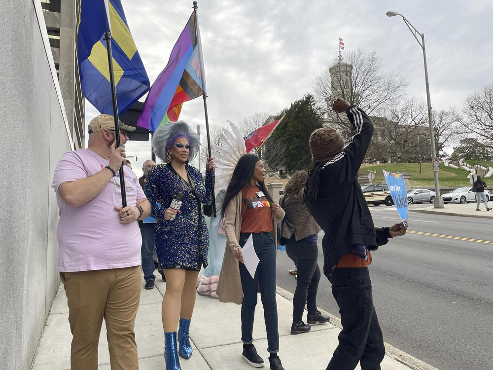 Advocates who oppose a bill that would restrict where certain drag shows could take place march in Nashville.