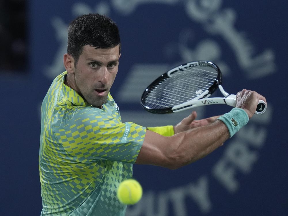 Serbia's Novak Djokovic returns the ball to Daniil Medvedev during their semi final match of the Dubai Duty Free Tennis Championships in Dubai, United Arab Emirates, on March 2.
