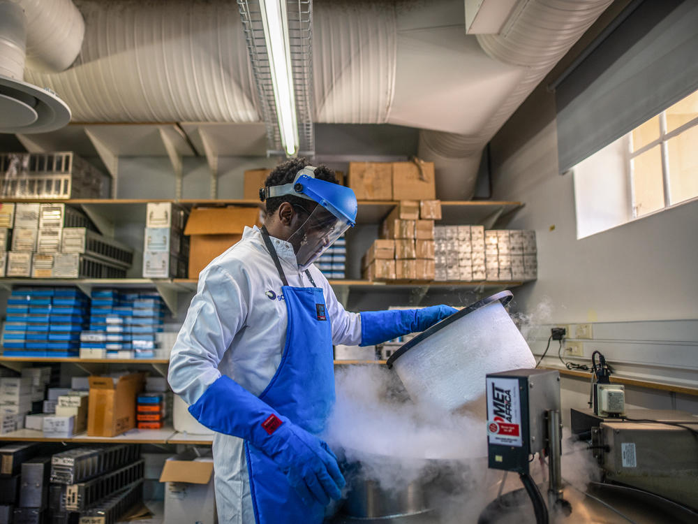 Munyaradzi Musvosvi, a researcher who works for the South African Tuberculosis Vaccine Initiative, in a storage facility at the University of Cape Town that holds in deep freeze the blood samples of people exposed to TB. He's part of a team working to develop a potential mRNA vaccine by looking at the immune cells in the blood samples.