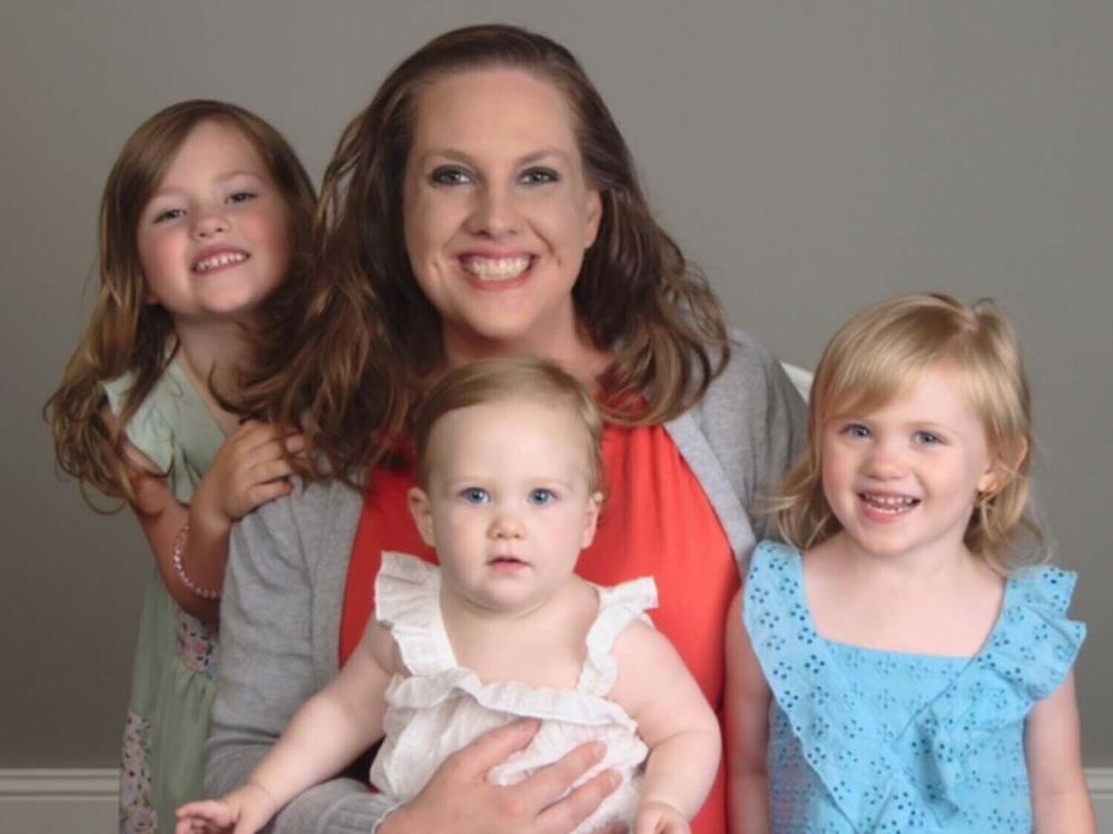 Stephanie Roth and her three children. Roth works full time but struggles to keep up with bills as prices rise. Like millions of Americans, she has found herself in mounting credit card debt.