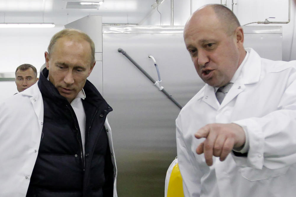 Yevgeny Prigozhin (right) shows then-Prime Minister Vladimir Putin his school lunch factory outside St. Petersburg, Russia, on Sept. 20, 2010.
