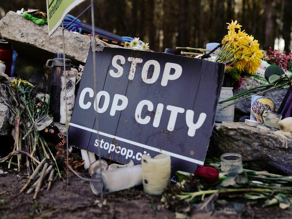 A makeshift memorial for environmental activist Manuel Esteban Paez Terán, who was shot and killed by law enforcement during a raid to clear the construction site of a police training facility that activists have nicknamed 