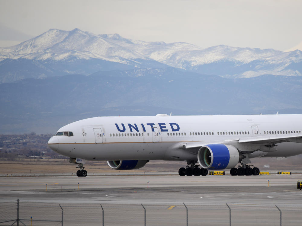 A United Airlines jetliner taxis to a runway for take off from Denver International Airport, Dec. 27, 2022.