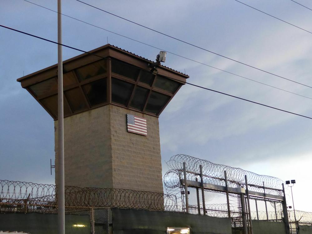 The main gate at the U.S. military prison at Guantánamo Bay, Cuba, in 2018. The prison houses suspected terrorists rounded up after the 9/11 attacks.