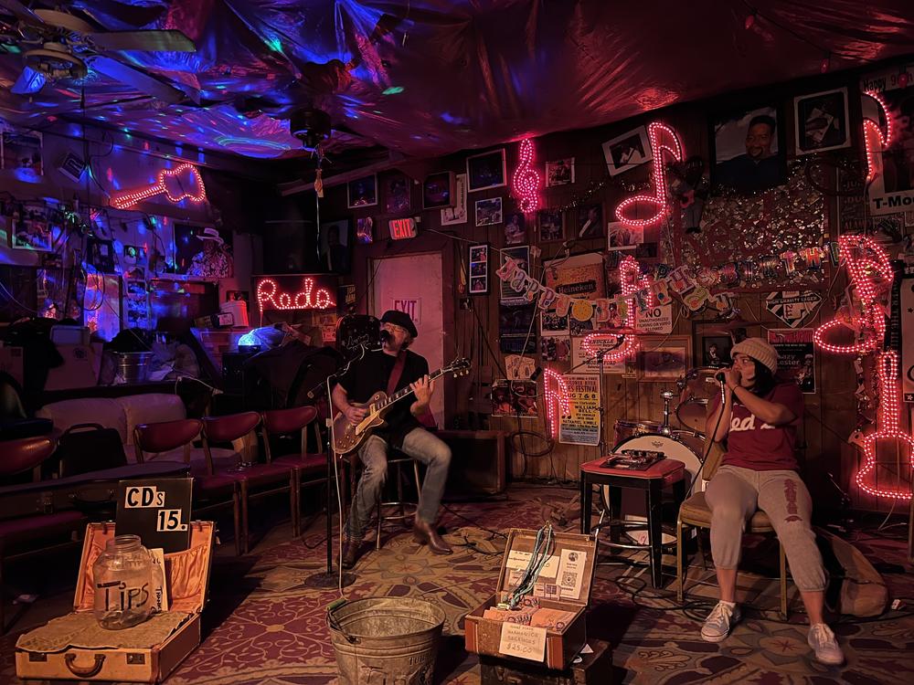 A show at Red's, a juke joint in Clarksdale, Miss., where it's advertised that you can see live blues seven nights a week.