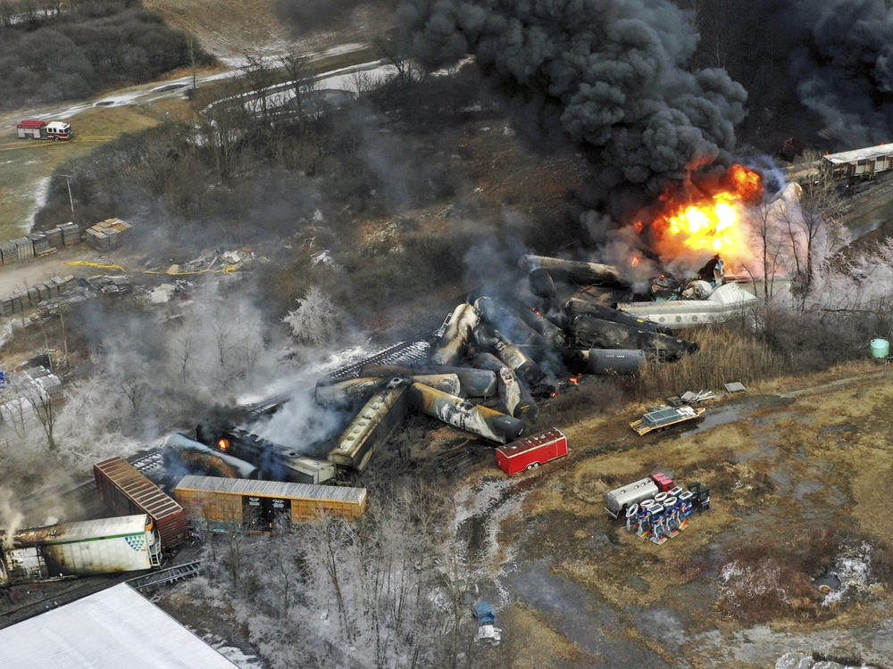 Portions of a Norfolk Southern freight train that derailed in East Palestine, Ohio, remained on fire by the following day on Feb. 4, 2023.