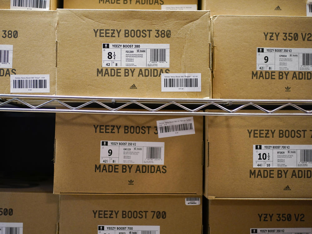 Boxes containing Yeezy shoes made by Adidas are seen at Laced Up, a sneaker resale store, in Paramus, N.J., on Oct. 25, 2022. Adidas' breakup with the rapper formerly known as Kanye West and the inability to sell his popular Yeezy line of shoes helped batter the company's earnings at the end of last year.