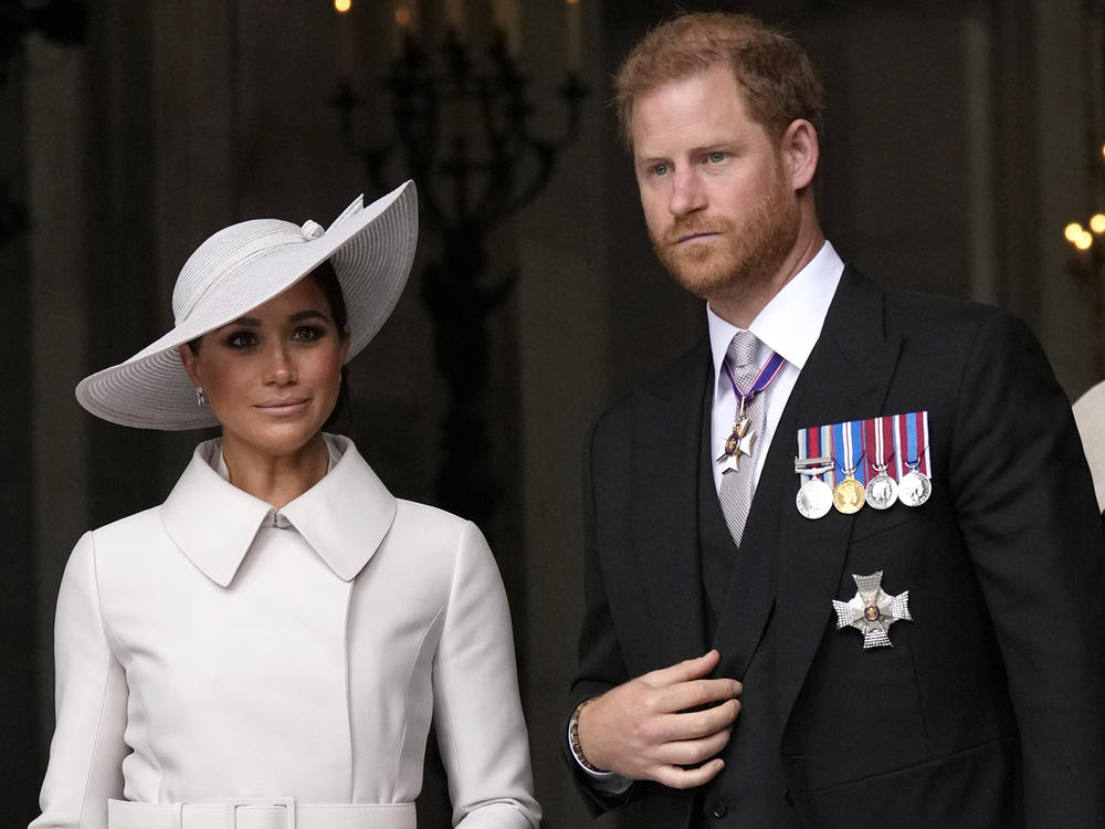 Prince Harry and Meghan Markle, Duke and Duchess of Sussex, leave after a service of thanksgiving for the reign of Queen Elizabeth II at St Paul's Cathedral in London on June 3, 2022.