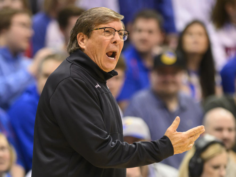 Texas Tech head coach Mark Adams calls instructions to his team against Kansas during a game in Lawrence, Kan., on Feb. 28.