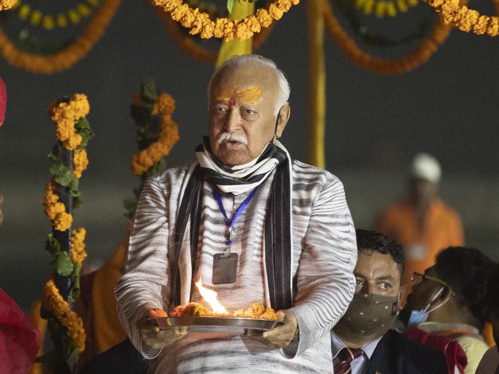 Hindu nationalist Rashtriya Swayamsevak Sangh (RSS) chief Mohan Bhagwat offers prayers at the annual traditional fair of Magh Mela in Prayagraj, India, in 2021. Earlier this year, Bhagwat said that gay people are a part of Indian society and have the right to live the way they want to.