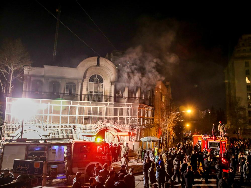 Iranian protesters set fire to the Saudi diplomatic mission in Tehran during a demonstration against the execution of prominent Shia cleric Nimr al-Nimr by Saudi authorities, on Jan. 2, 2016. Nimr was a driving force of protests in 2011 in Saudi Arabia's east.