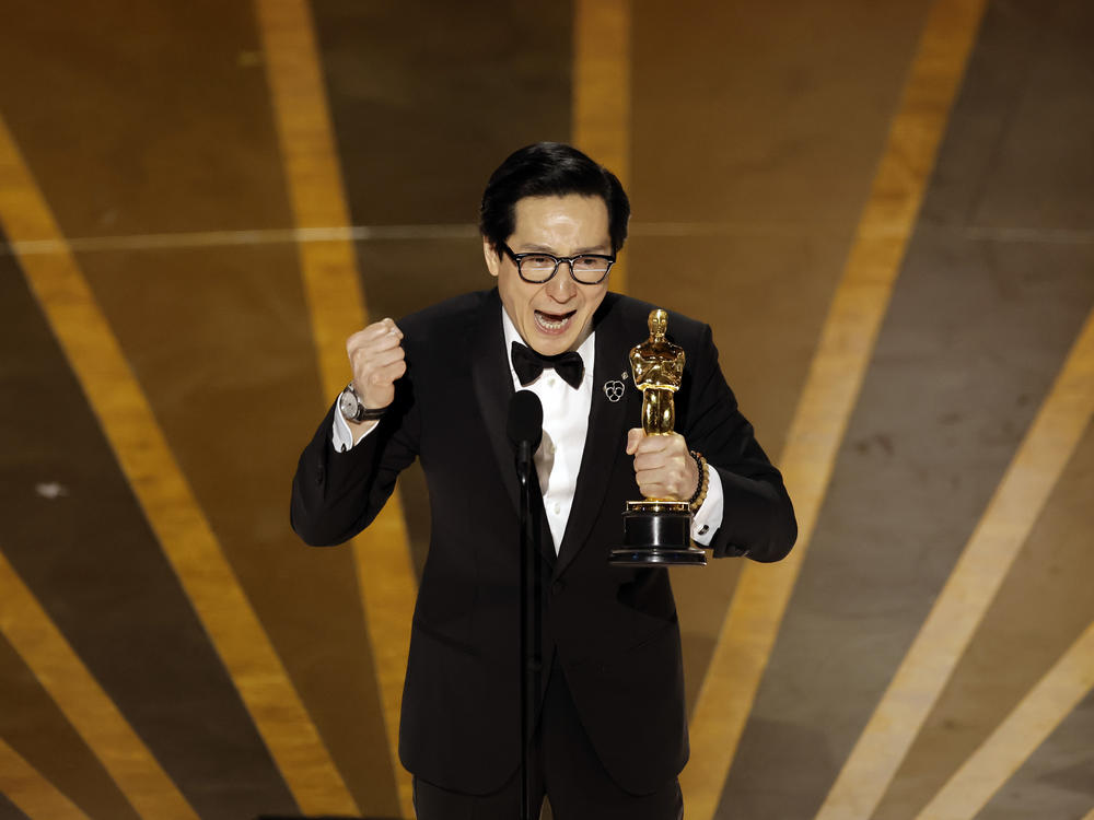 Ke Huy Quan accepts the Academy Award for best supporting actor for <em>Everything Everywhere All at Once</em> at the 95th Annual Academy Awards at Dolby Theatre on March 12, 2023 in Hollywood, Calif.
