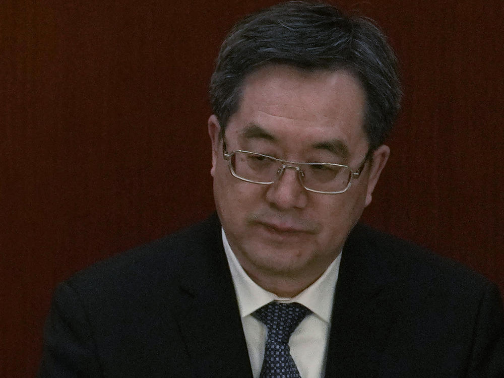 Politburo Standing Committee member Ding Xuexiang attends a session of China's National People's Congress at the Great Hall of the People in Beijing, Tuesday, March 7, 2023.